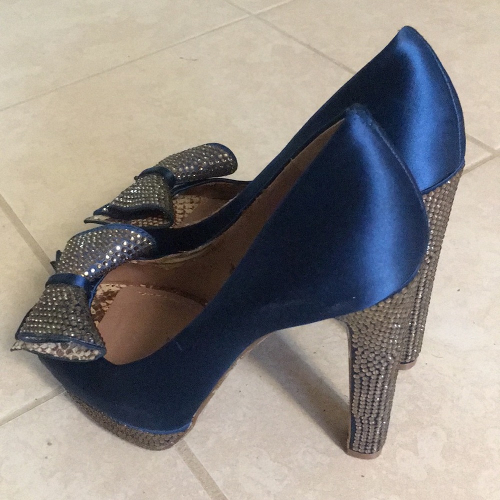 Vince Camuto teal blue, reptile, and satin shoe.